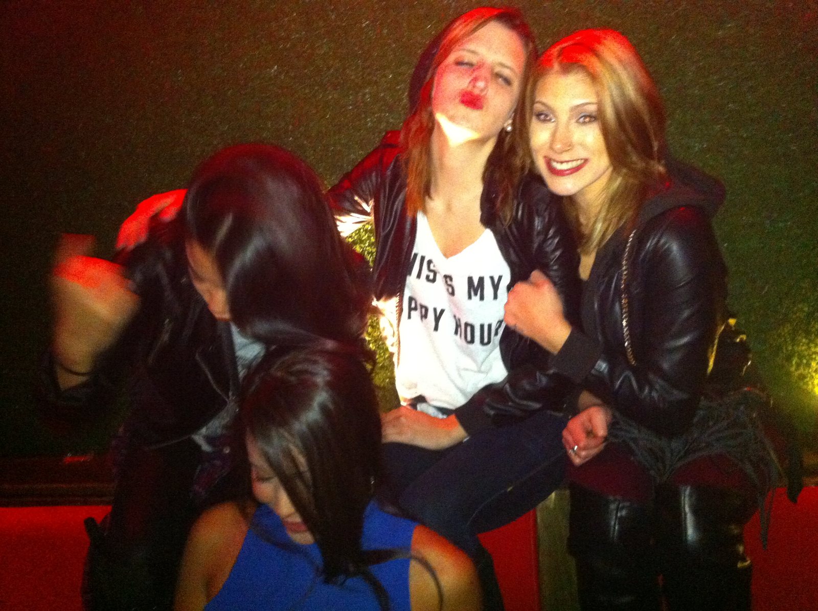 Friends sharing a candid moment in the club