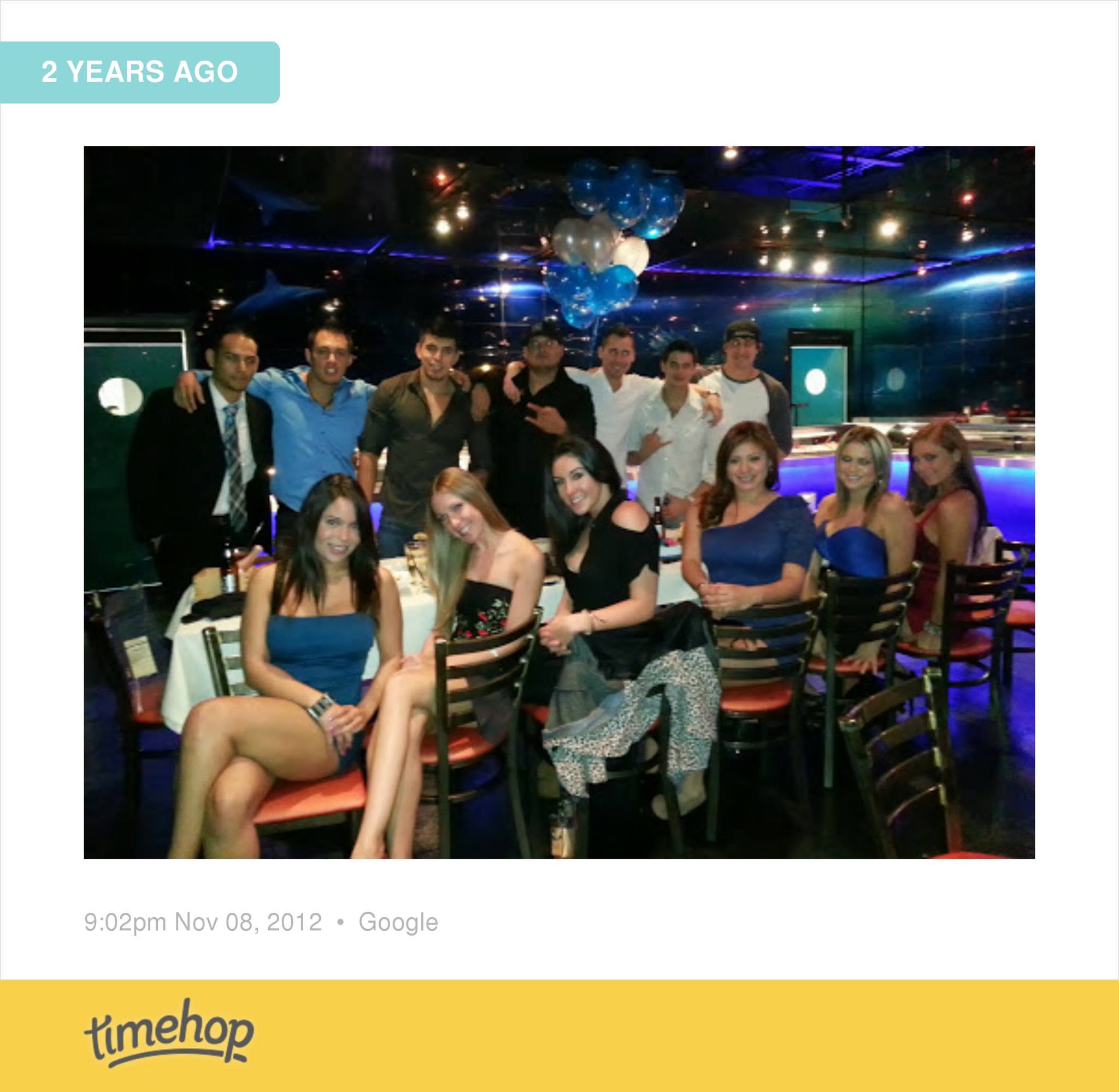 A full birthday-night group gathered inside a Houston club