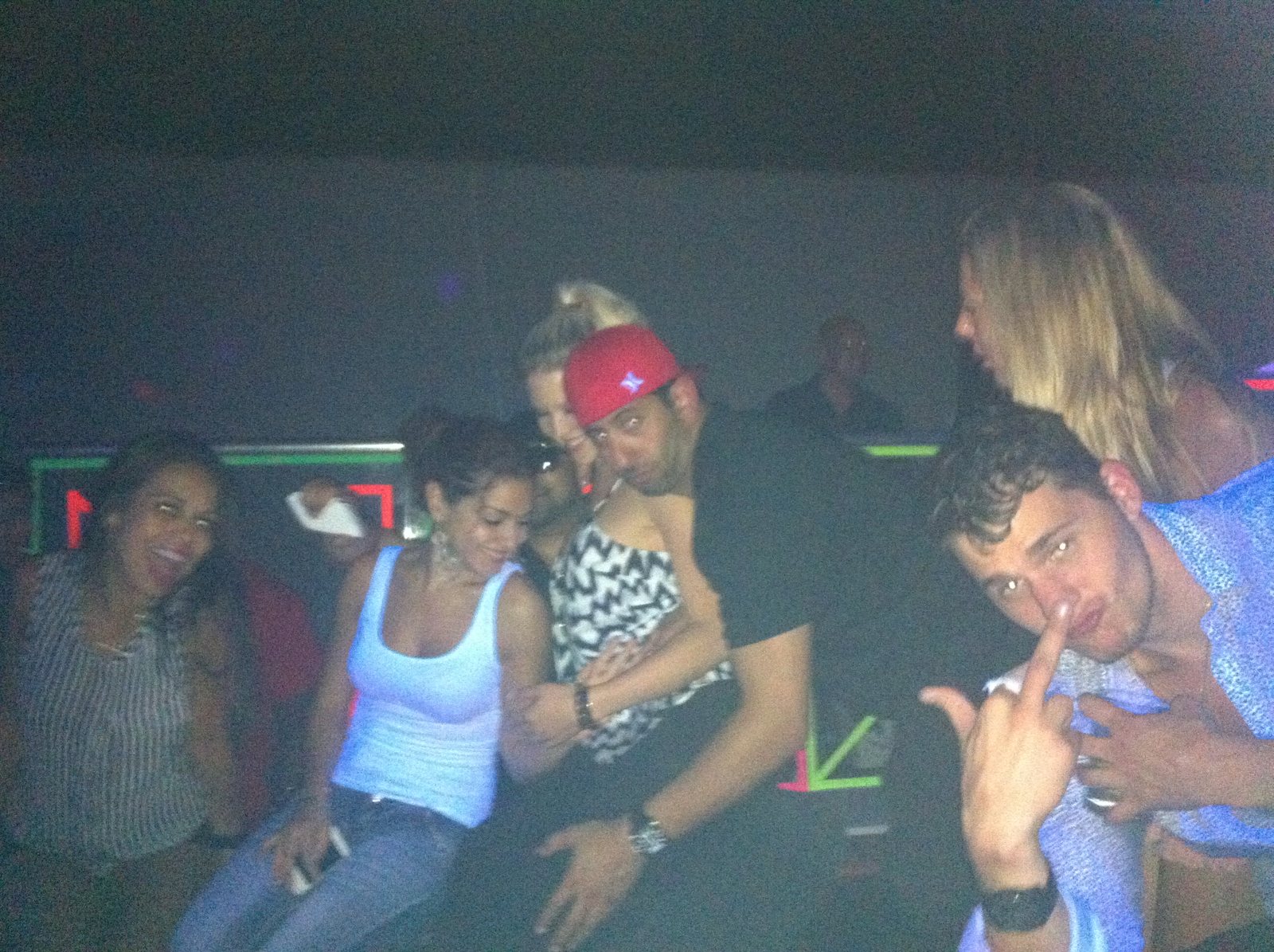 Friends smiling together on the dance floor