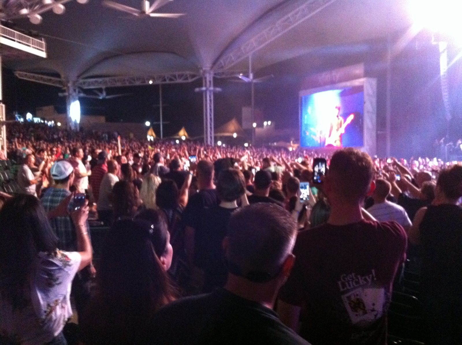 A wide view across a full live music venue