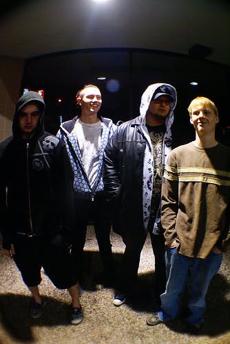 Paradigm Grey band portrait under a pool of light