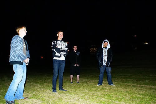 Paradigm Grey lineup standing in a field at night
