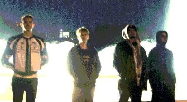 Hazy Paradigm Grey lineup portrait in front of a lit fountain