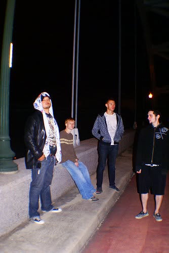 Paradigm Grey lineup gathered on a city sidewalk at night