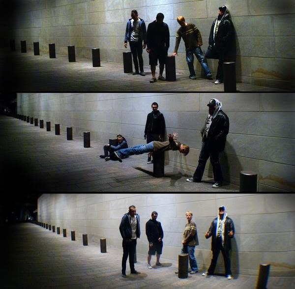 Three-frame Paradigm Grey band portrait in an urban corridor